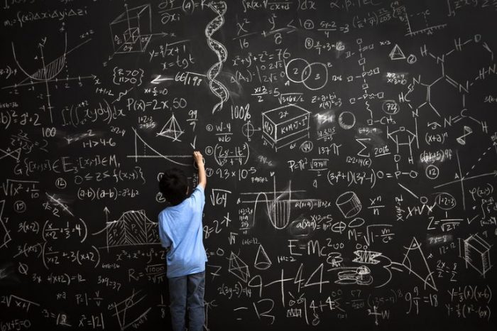 young-boy-writes-math-equations-on-chalkboard-168351254-5ad90020ba61770036501446